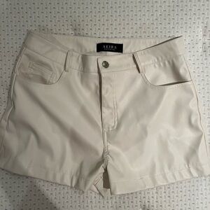 Akira white faux leather shorts